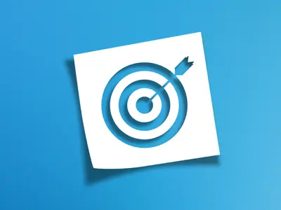 Note paper and target sign with copy space on blue background