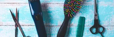 Image of hair cutting equipment over blue background