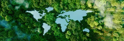 A lake in the shape of the world's continents in the middle of untouched nature. A metaphor for conservation, climate change, global warming and the fragility of nature.