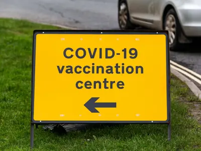 COVID 19 Vaccination Centre directional sign