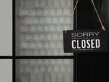 Sorry we are closed sign hanging from door